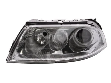 VW Фара основная Bi-Xenon с мотором,без газор.лампы,с лампами накал.D2S/H7 PY21W W5W лів.Passat 00- HELLA 1EL 008 340071